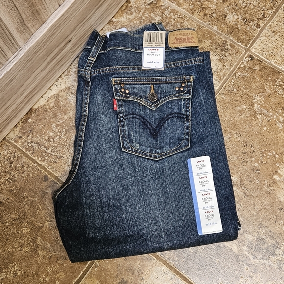 Levi's I  515 Mid Rise Boot Cut Jeans. - Picture 2 of 11